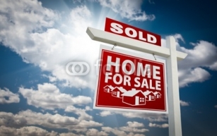 Red_Sold_Home_For_Sale_Real_Estate_Sign_Over_Clouds_and_Sky.jpg
